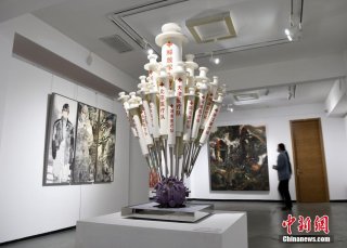 全军抗疫暨军事题材美术作品展在北京举行